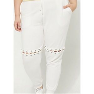 Ivory lace up knee cut out joggers